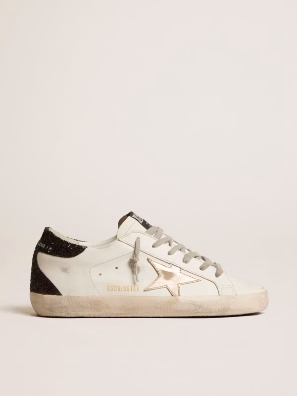 Super-Star avec étoile dorée et contrefort à paillettes noires